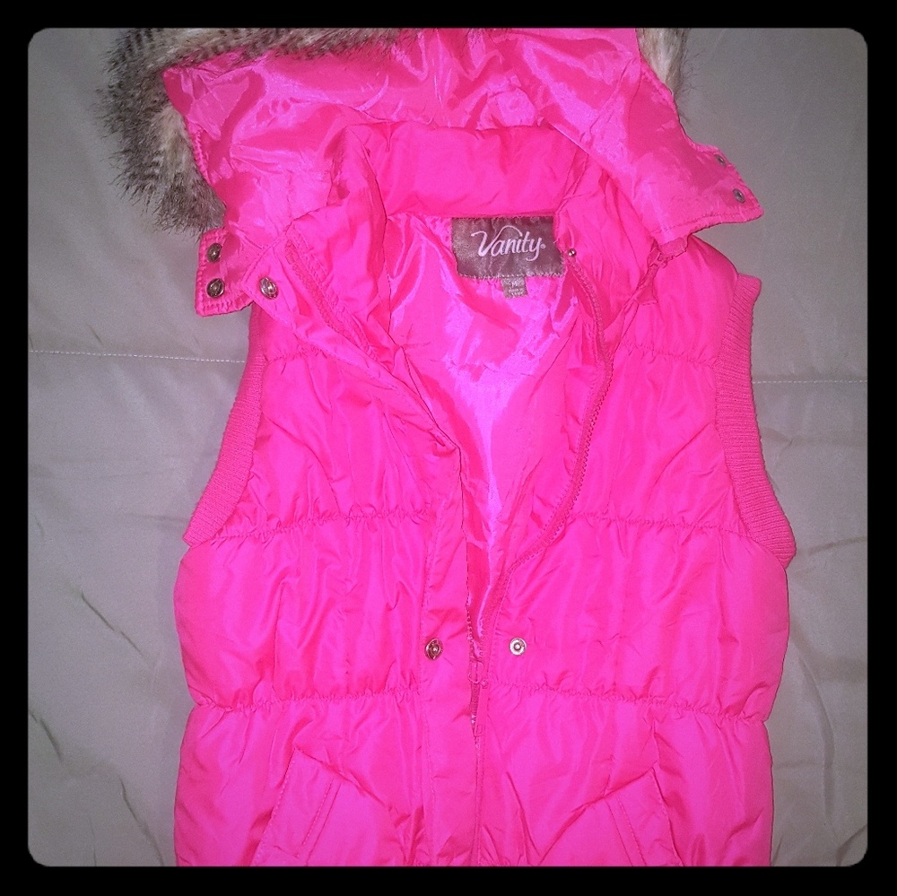 Puff vest with hood. Fur around the hood